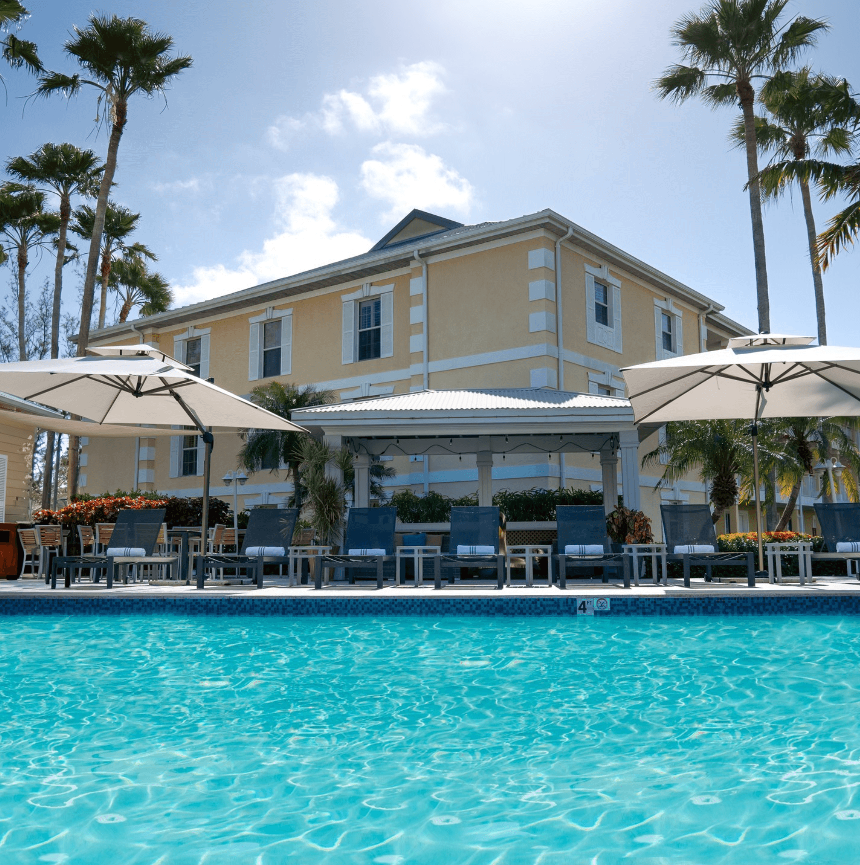 Sunshine Hotel & Suites pool and grounds
